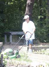 Tim mowing the grass